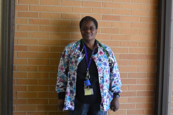TEACHER SPOTLIGHT: CENTRAL HIGH SCHOOL WELCOMES NEW NURSE, KIM LYKES -- New nurse, Kim Lykes, posing for a picture next to the gym.