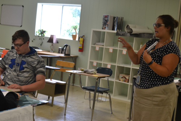 TEACHER SPOTLIGHT: SAY BONJOUR TO AMIE WILSON, CENTRALS NEW FRENCH INSTRUCTOR -- Mrs. Wilson explains the rules of a review game to her French students.