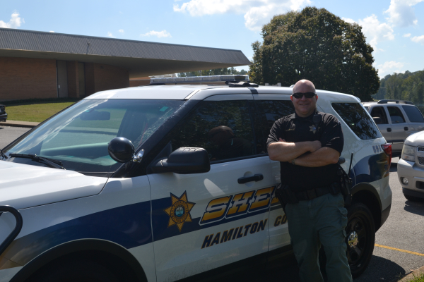 NEW SRO FOR CENTRAL HIGH SCHOOL--
Sgt. Merkle poses next to his patrol car. 