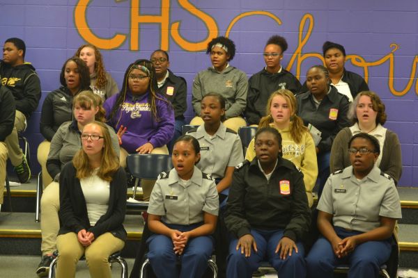 CENTRAL CHOIR WARM-UP --  Choir gets ready for the upcoming festival.