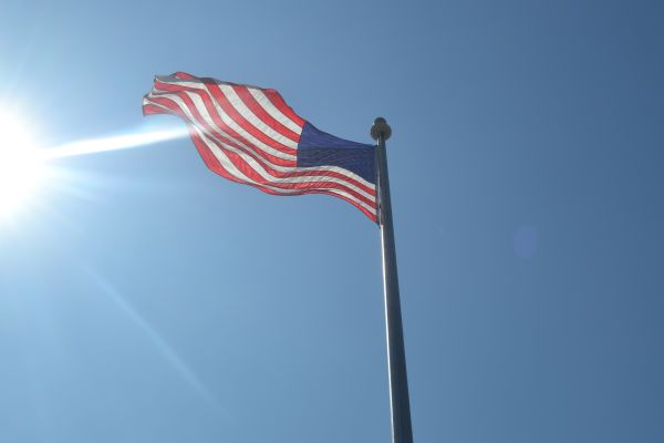 SEE YOU AT THE POLE -- Students gathered around flagpole Wednesday to pray.