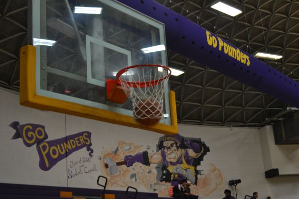 FORWARD THINKING FOR THE 2018 BOYS BASKETBALL SEASON -- Ball going into the hoop of Centrals gym.