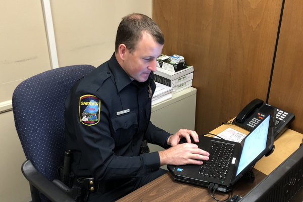 CENTRAL HIGH WELCOMES NEW SRO PAUL SOYSTER -- Deputy Soyster working on student cases.