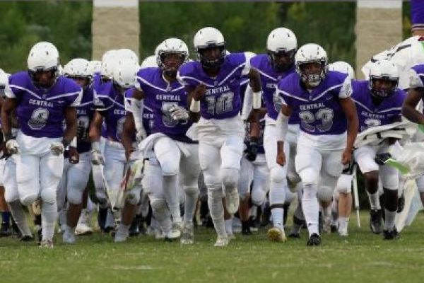 CONCUSSION ARE A WORRY AT CENTRAL HIGH SCHOOL -- Centrals football team running in at the start of a football game. 