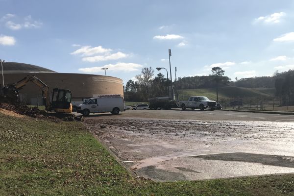 PIPE BURST CAUSES FLOODING -- The parking lot outside of C- Pod was covered in water and mud after a burst in the water pipes.