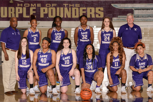 RICK MAY CELEBRATES HIS SUCCESSFUL COACHING CAREER -- The Lady Pounders and their coaches pose for their annual team photos after a successful season.