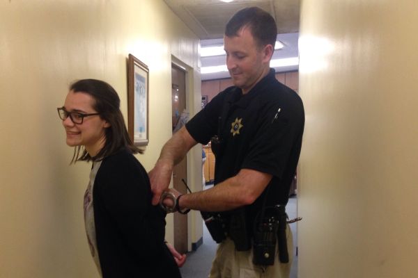 LETS BE SERIOUS CENTRAL -- Simulating getting handcuffed with SRO Deputy Soyster. 