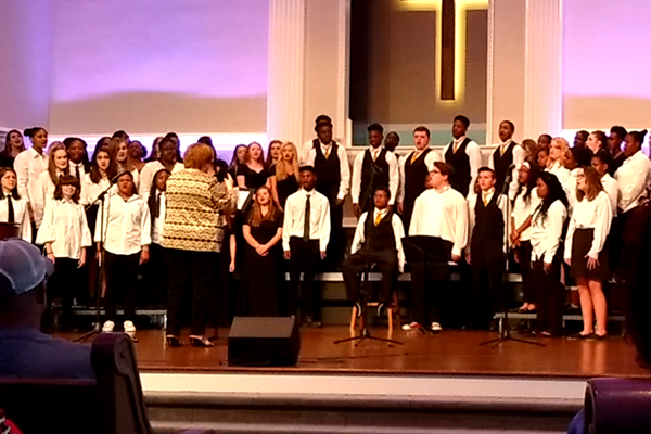 BOUTWELL'S LAST CENTRAL CONCERT -- Mrs. Boutwell directs the Freshman and Concert choirs in their last concert with her.