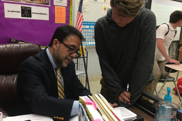 JOSE SANCHEZ COMMEMORATES HIS TIME SPENT AT CENTRAL IN RESPONSE TO HIS RETIREMENT -- Mr. Jose Sanchez is depicted helping a student from his Spanish II class in the picture above.