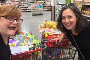 ENGLISH TEACHER SALLY WHITE VOLUNTEERS AT MEXICAN BORDER OVER THE SUMMER -- Mrs. White and her best friend, Alice, purchasing items to donate.