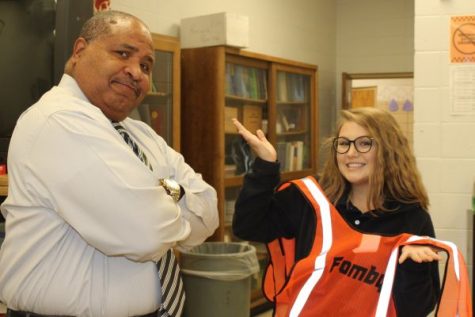 CENTRAL'S NEXT TOP CONSTRUCTION WORKER -- Columnist Laurelie Holmbeg is scolded by biology teacher, Mr.Fomby.