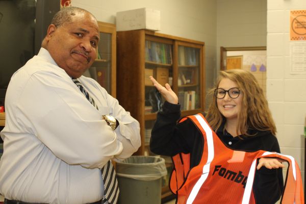 CENTRALS NEXT TOP CONSTRUCTION WORKER -- Columnist Laurelie Holmbeg is scolded by biology teacher, Mr.Fomby. 