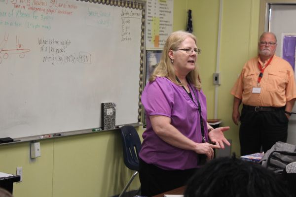 TEACHER SPOTLIGHT: CENTRAL ALUMNA LEVERETTE (77) IS NEW PHYSICAL WORLD CONCEPTS TEACHER-- Ms. Leverette teaching her 7 period Physical World Concept class. 