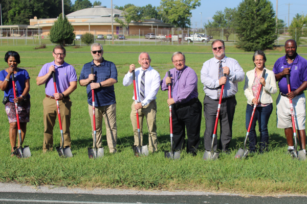 CENTRAL ADMINISTRATORS POSE WITH COUNTY COMMISSIONERS AND AFFILIATES IN HONOR OF TRACK BEING BUILT  -- From left to right: Michelle Cochran, David Carpenter, Chester Bankston, Finley King, Dr. Steve Highlander, Steve Lewis, Jennifer Lewis, and Gary Bloodsaw.