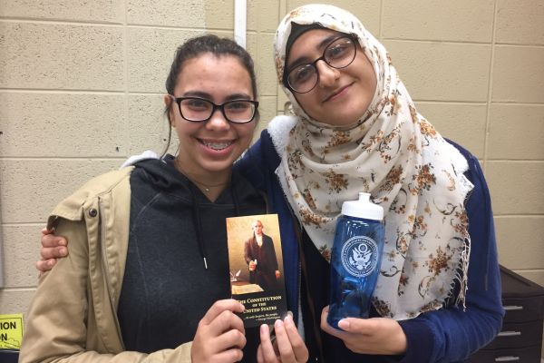 AP GOVERNMENT STUDENTS GET A GLIMPSE INSIDE FEDERAL COURT -- (Left to right) Seniors Deanna Wnuk and Zeena Whayeb enjoy their free pocket Constitution and water bottle from federal court. 