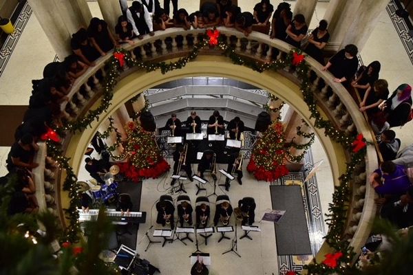 CENTRALS MUSIC DEPARTMENT SPREADS HOLIDAY CHEER WITH CHRISTMAS AT THE COURTHOUSE PERFORMANCE -- Centrals Jazz Band and Choir pose for a photo in the rotunda of the Hamilton County Courthouse during the annual Christmas at the Courthouse event. 