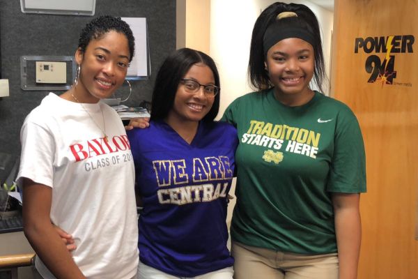 SOPHOMORE MADISON TAYLOR REPRESENTS CENTRAL HIGH AS TEEN REPORTER ON POWER 94 -- Madison Taylor (middle) prepares to report Centrals events on Power 94.