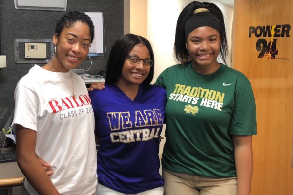 SOPHOMORE MADISON TAYLOR REPRESENTS CENTRAL HIGH AS TEEN REPORTER ON POWER 94 -- Madison Taylor (middle) prepares to report Central's events on Power 94.