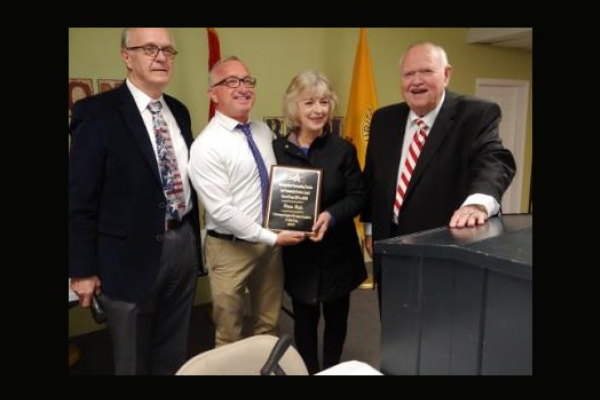 PRINCIPAL FINLEY KING IS PRESENTED WITH FREEDOMS FOUNDATION DISTINGUISHED EDUCATOR AWARD -- From left to right: Clerk Larry, Principal Finley King, Diane Hale, and Gene Pike pose after presenting King and Hale with awards from the Freedoms Foundation.