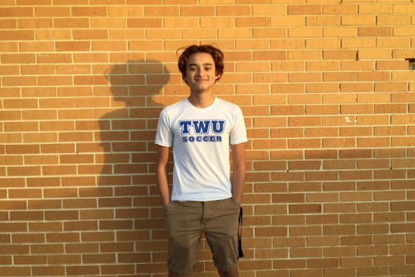 SENIOR IVAN MICHEL LLAMAS IS AWARDED WITH SOCCER SCHOLARSHIP FROM TENNESSEE WESLEYAN UNIVERSITY --
Senior Ivan Michel is wearing his Tennessee Wesleyan University Soccer shirt in response to receiving a soccer scholarship from the aforementioned college.