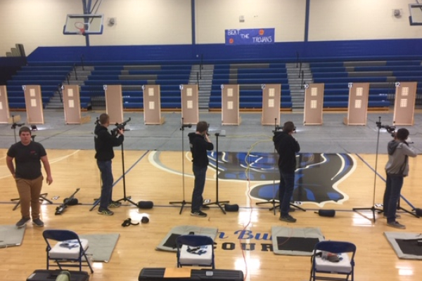 CENTRAL HIGHS RIFLE AND ACADEMIC TEAMS SHOWCASE THEIR TALENT IN COMPETITIONS -- Rifle team competitors aim to hit the targets in order to out-do their opponents. 