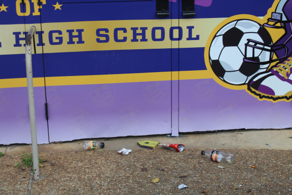 LITTER LYING IN FRONT OF THE CENTRAL HIGH SCHOOL GYM -- A few random pieces of trash were left by students.