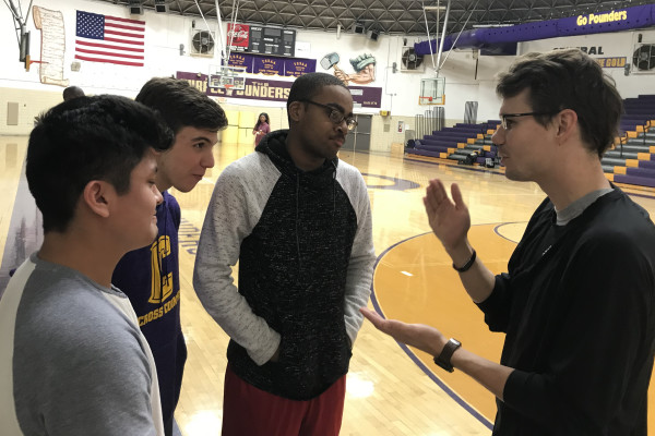 CENTRAL TRACK AND FIELD PREPARES FOR UPCOMING SEASON -- Head Coach Matthew Joyner talks to his runners in the gym before they begin workouts.