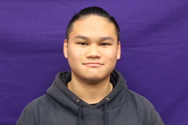 2019 CENTRAL STUDENTS OF THE WEEK -- Senior Cristopher Chea poses as he is congratulated for being student of the week.