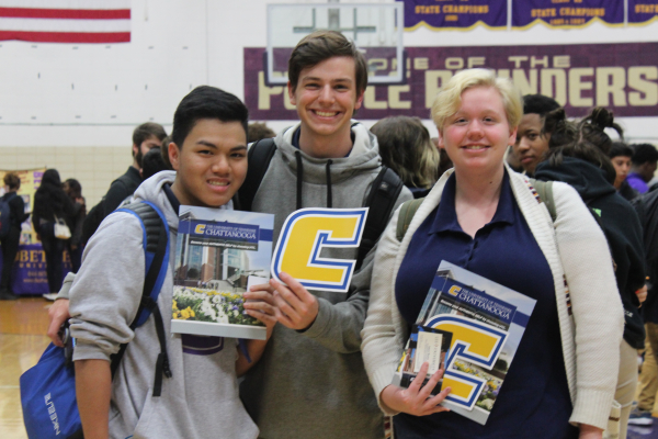 2019 CENTRAL HIGH SCHOOL COLLEGE FAIR-- Three seniors pose with UTC brochures.