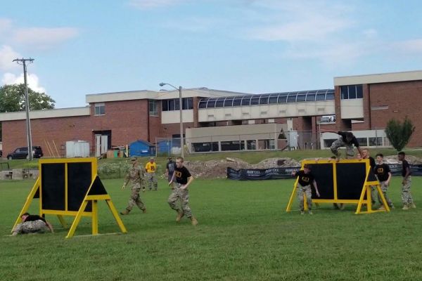 ROTC HOSTS FUNDRAISER TO SUPPORT THEIR NEW OBSTACLE COURSE -- The raiders group working hard to win their competition.