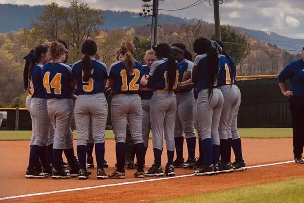 THE LADY POUNDERS PLAN TO BRING THE HEAT FOR THE UPCOMING SEASON -- The softball team huddles up in preparation of an upcoming game.