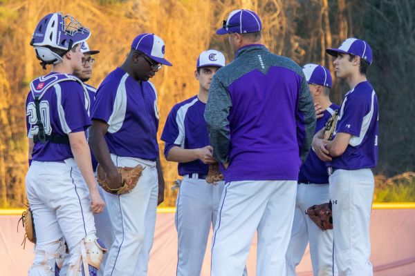 CENTRAL BASEBALL DEFEATS TYNER ACADEMY 18-7 -- Coach Carter gives the players one last word of encouragement before the game begins.