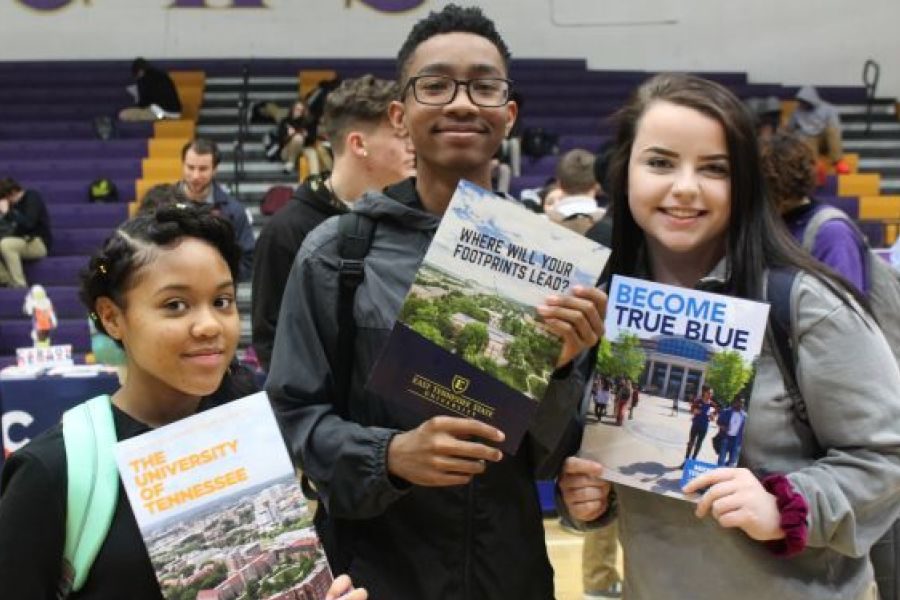 2019 CENTRAL HIGH SCHOOL COLLEGE FAIR-- Three students show off their choice colleges.