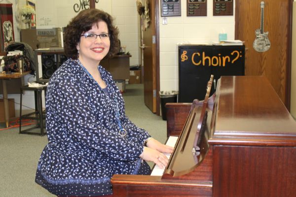 CHOIR DIRECTOR KATHERON LATHAM PLAYS NEW PIANO -- Katheron Latham shows off the new piano donated by Bayside Baptist Church.