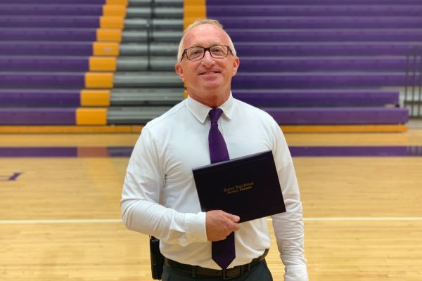 PRINCIPAL FINLEY KING SAYS HIS FINAL GOODBYES -- King took individual diploma pictures with Centrals senior class before his departure.