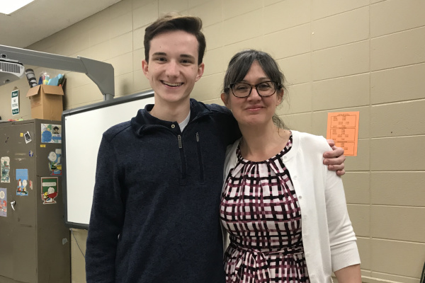 MISSING MS. WHITE — Ms. Sally White poses with Central graduate and former Central Digest Editor in Chief Preston Fore.