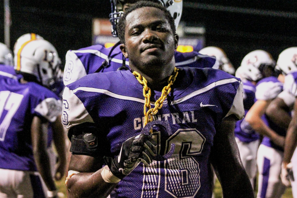 RUNNING BACK MICHAEL MCGHEE SIGNS TO SEWANEE THE UNIVERSITY OF THE SOUTH -- Michael McGhee poses for the camera after he earns the turnover chain.