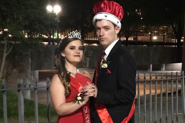 THE RED CARPET: A NIGHT TO REMEMBER -- Senior prom Queen Maggie Pedigo (left) is standing next to prom King Mercer Wilkey (right).