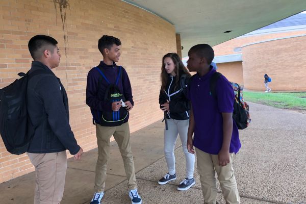 CENTRAL HIGH SCHOOL STUDENTS DRESS FOR SUCCESS - - Central High School freshmen wait to go home after school, while in their school dress code.