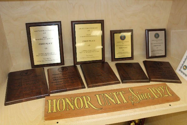 CENTRALS JROTC MARCHES TO SUCCESS AT ARMED FORCES DAY PARADE -- The plaques from past years’ parades are on display in the Central High School armory.