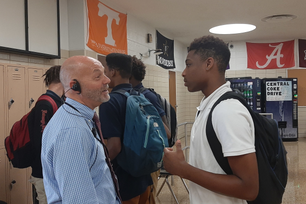 PRINCIPAL IANNARONE CHATS WITH A STUDENT -- Principal Iannarone gives a warm welcome back to a Central student.