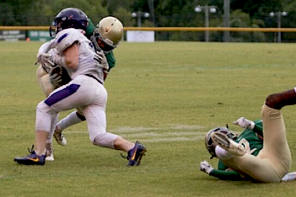 CENTRAL IS SETTING UP FOR A COMEBACK GOING INTO WEEK THREE OF FRIDAY NIGHT LIGHTS-- Central Player fighting through the field aiming for a touchdown against Notre Dame.