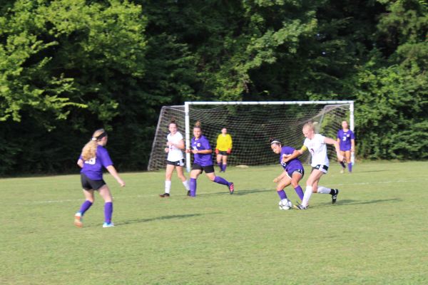 CENTRALS GIRLS SOCCER TEAM STRIVES FOR IMPROVEMENT DURING HIXSON HIGH SCHOOL MATCH -- Karleigh Schwarzl tries to steal the ball from a Hixson High School player.