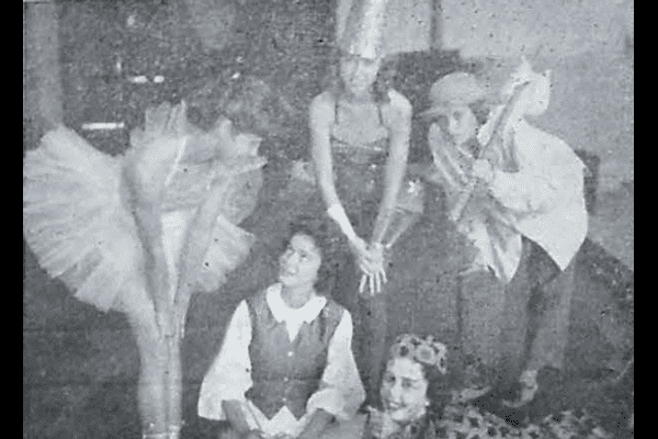 LOOKING BACK: 1959-1960 POUNDERS CONTINUE TRADITION OF POUNDERS ON PARADE -- Students are preparing for the Pounders on Parade show. Pictured left to right are Patsy Farmer, Rachel Temple, Linda Park, Diane Alverson, and Gerry Robinson.