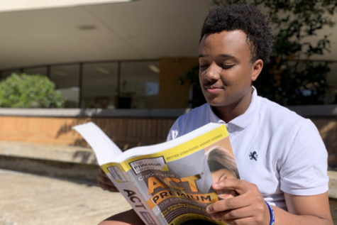 NEWLY IMPLEMENTED ACT SUBJECT TESTING CAUSES MIXED EMOTIONS WITH STUDENTS -- Junior Nate Wellington is pictured studying for the ACT.