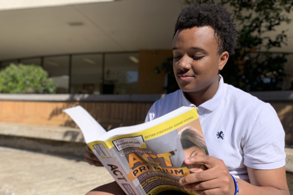 NEWLY IMPLEMENTED ACT SUBJECT TESTING CAUSES MIXED EMOTIONS WITH STUDENTS  -- Junior Nate Wellington is pictured studying for the ACT.