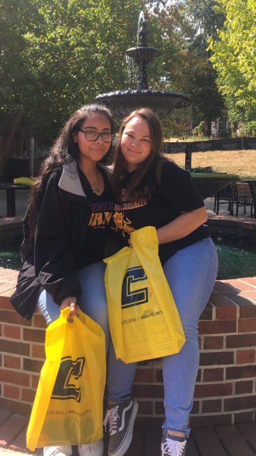 CENTRAL SENIORS TOUR THE UNIVERSITY OF TENNESSEE AT CHATTANOOGA CAMPUS -- Seniors Elena Salgado and Abby Young show off their Chattanooga Mocs themed goody bags after dining in the universitys cafeteria.
