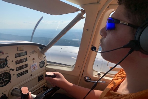 TZVI STRAUSS TAKES TO THE SKY TO PURSUE HIS DREAMS -- Central Junior Tzvi Strauss is pictured flying during an aviation lesson.