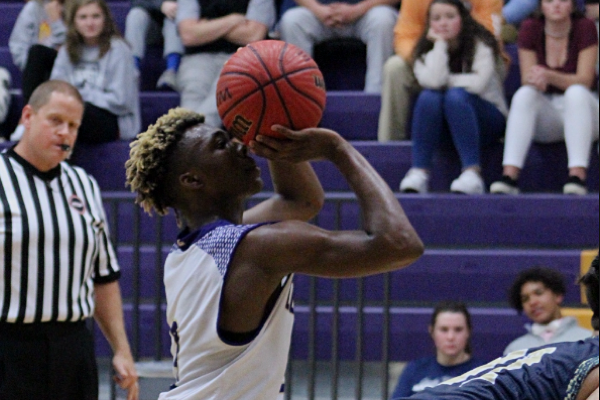 CENTRAL S BOYS BASKETBALL LOSES AGAINST BOYD BUCHANAN BUT COMES BACK WITH A WIN AGAINST SODDY DAISY -- Senior Jokbi White, is shooting a freethrow after he is fouled in a game against Soddy Daisy High School. 