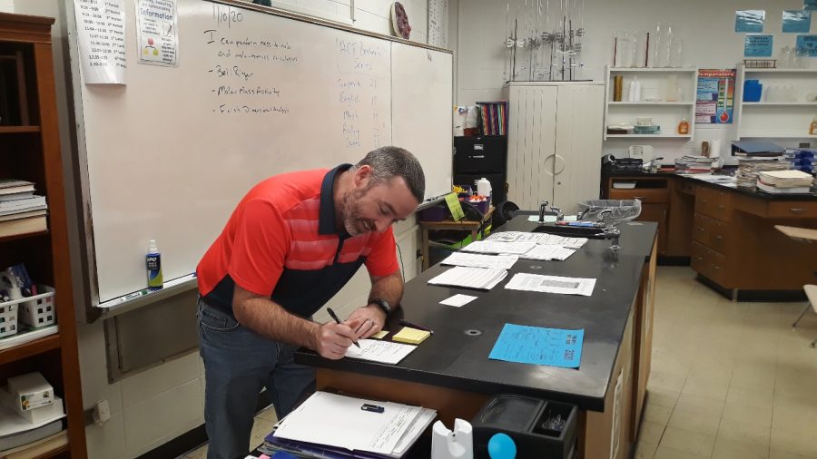 TREVOR BRITTINGHAM TAKES POSITION AS CHEMISTRY TEACHER — Trevor Brittingham is hard at work ensuring that students get back on track with their chemistry standards.